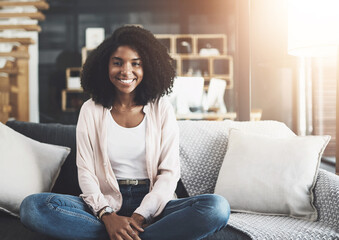 Wall Mural - Home, smile and portrait of woman on sofa for apartment, satisfaction and break on weekend. Happy, female person and relax on couch in living room for comfortable, rest and confidence in morning