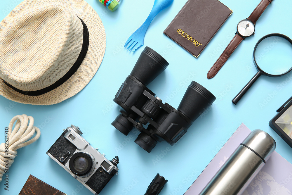 Set of travel items on blue background