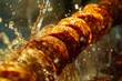 © VISUAL BACKGROUND - A close up of sausages being drenched in water.
