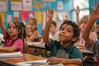 © Dassen - Portrait of black schoolboy raising hand in classroom during lesson at elementary school