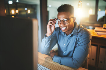 Leinwandbilder - Office, computer and happy businessman at night for website, research and web design software. Corporate, working late and worker on pc for programming, information technology and cybersecurity