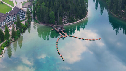 Wall Mural - Italy dolomites natural park braies lake surroundings boats and general images with drone