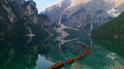 Wall Mural - Italy dolomites natural park braies lake surroundings boats and general images with drone