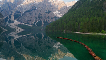 Wall Mural - Italy dolomites natural park braies lake surroundings boats and general images with drone