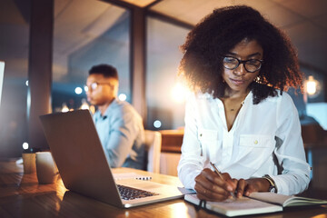 Poster - Laptop, notebook and woman in office at night with research for wealth management report with deadline. Computer, writing and African female actuary with client schedule financial investment analysis