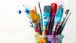 © Ziyan - Art brushes in paint in a creative pot on a white background with space for copy and text.