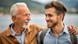 © NewFresh  - Portrait of a senior father and son looking at each other and smiling