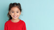 © pariketan - Hispanic girl in red sweater smile to copy space for text for advertising