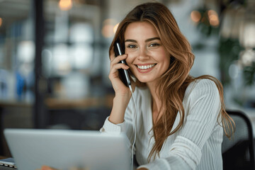 Wall Mural - Smiling mature business woman talking on phone while working on laptop in office professional mid aged executive manager making business call