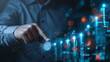 © btiger - Businessman Touching Growth Graph on Virtual Screen Analyzing Financial Data for Investment and Revenue Goals