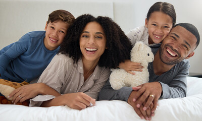 Poster - Family, portrait and support in home bedroom with smile for wellness, relationship and trust in morning. Parents, face and children on bed for happy, bonding and relax together with hug on weekend