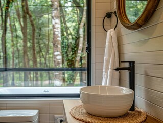 Canvas Print - Bathroom with a large window looking out onto a forest. AI.