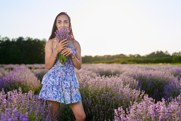 Wall Mural - Woman in a lavender field