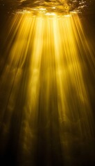 Wall Mural - Radiant yellow light burst  abstract beautiful rays on dark background with gold sparkles