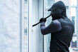 © Chanelle M/peopleimages.com - Man, criminal and crowbar for house crime, home invasion and breaking entering attempt with tool. Apartment, robbery and burglary or trespassing on property, security breach and owners safety risk