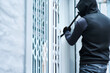 © Chanelle M/peopleimages.com - Man, criminal and crowbar for home crime, house invasion and breaking entering attempt with tool. Apartment, robbery and burglary or trespassing on property, security breach and owners safety risk