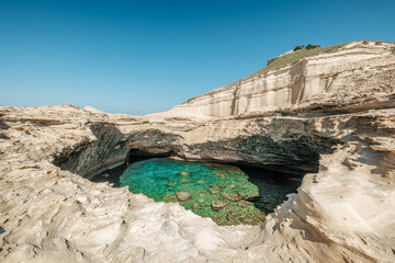 Wall Mural - Grotte de Saint Antoine a collapsed limestone cave on the Mediterranean coast near Bonifacio on the south coast of the island of Corsica