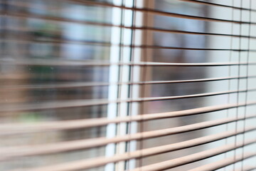 Aufkleber - A close-up shot of a window with blinds closed