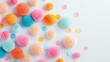© nattapon98 - Vibrant and colorful pom-poms and confetti on a white background create a cheerful and fun atmosphere. Ideal for party or celebration themes.