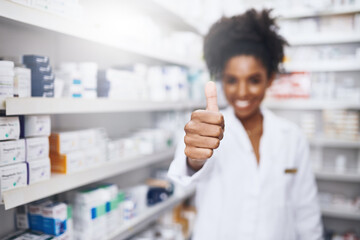 Canvas Print - Woman, medicine and thumbs up with healthcare shop, shelf and prescription care pills. Pharmacist, retail store and supply of approved supplements, vitamins and minerals for vitality and dispensary