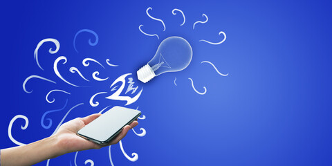 Poster - A hand holding a smartphone with an illustrated light bulb appearing from it against a blue background, representing creativity and inspiration