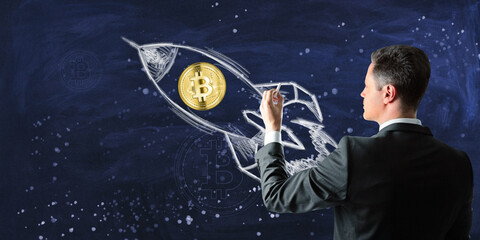 Poster - Man drawing Bitcoin and DNA strand on a chalkboard, conceptualizing cryptocurrency and genetics, dark blue background, creative concept