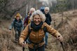 © Dina - health and wellness of senior group in their 70s in leisurely hike together, park trails and nature, promoting benefits of regular physical activity for seniors, healthy lifestyle for elderly friends