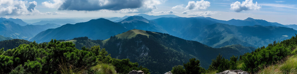 Wall Mural - Wide panoramic photo of the mountains against the blue sky