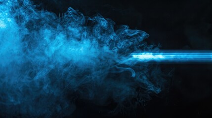 Poster - A narrow beam of blue light cutting through a cloud of smoke, providing an eerie, otherworldly effect on a black background. 