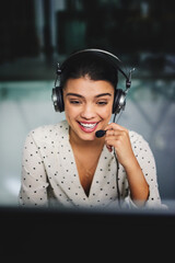 Poster - Night, smile and woman with headset in call center for customer service, discussion and help to client. Agent, consulting and happy with mic at work for IT support, solution or system troubleshooting