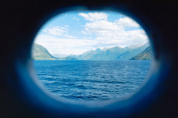 Wall Mural - norway. nature in fjords. view fron the ship. high mountains and reflections on the surface of the w