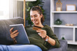 © JorSons/peopleimages.com - Credit card, relax and woman with tablet on sofa for subscription, transaction or online shopping in living room. Home, payment and young girl for membership, streaming service or internet banking