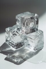 Poster - A pair of ice cubes sit on a table, frozen in time