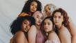 © Berkah - Group of women with different body and ethnicity posing together to show the woman power and strength. Curvy and skinny kind of female body concept.