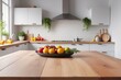 © Ayahe Stock - blurred Sleek cabinets and stainless steel appliances define a modern kitchen interior with empty tabletop