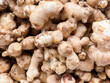 © Austockphoto - close up of pieces of ginger at the markets
