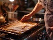 © Alexandr - Person Cooking Food on Stove