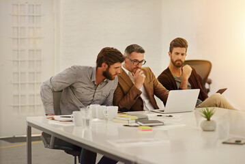 Poster - Group, business people and manager with laptop on table for financial meeting, pitch or presentation. Team, accountant and collaboration in office with computer for economy, documents for strategy
