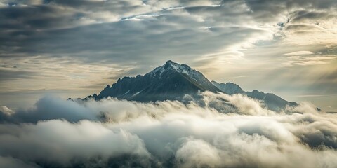 Wall Mural - Majestic mountain covered in thick fog creating a mystical atmosphere, fog, mountains, misty, landscape, nature, cold