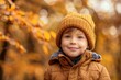© Ольга Лукьяненко - Autumn mood - Little happy child boy with a smile on fall nature background, Hello autumn, Stylish children kid