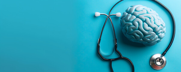 : A detailed brain model sits next to a stethoscope on a bright background. This image symbolizes neurological and psychological care, emphasizing the importance of mental health and medical atte