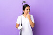 © luismolinero - Young golfer woman over isolated colorful background nervous and scared