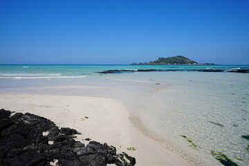 Wall Mural - fascinating shoaling beach with far island