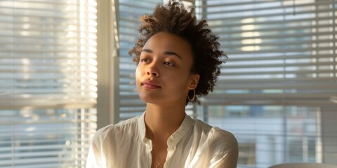 Canvas Print - Thoughtful young woman looking out the window. AI.