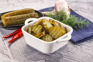 Canvas Print - Sliced marinated cucumbers in the bowl