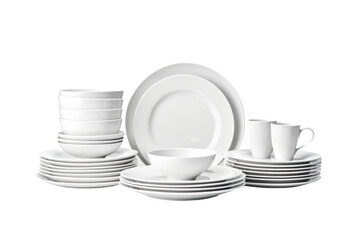 A classic white ceramic dinnerware set with plates, bowls, cups, and saucers. Isolated on white background