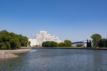 Wall Mural - Minsk, Belarus JULY 14, 2024:- view from Svisloch river on Nemiga district buildings. Beautiful capital city view