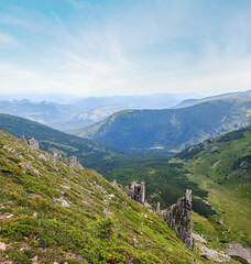 Wall Mural - Summer mountain slope with picturesque rock formations. Shpyci mountain, Carpathian, Ukraine.