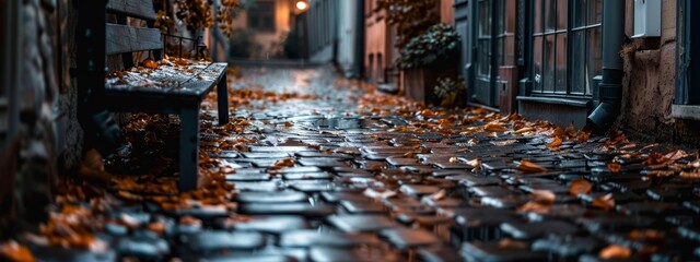 Wall Mural -  A bench atop a cobblestone path, beside a leafy building