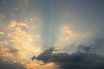 Wall Mural - the sky is filled with clouds and the sun is shining through them